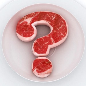 raw steak shaped into a question mark